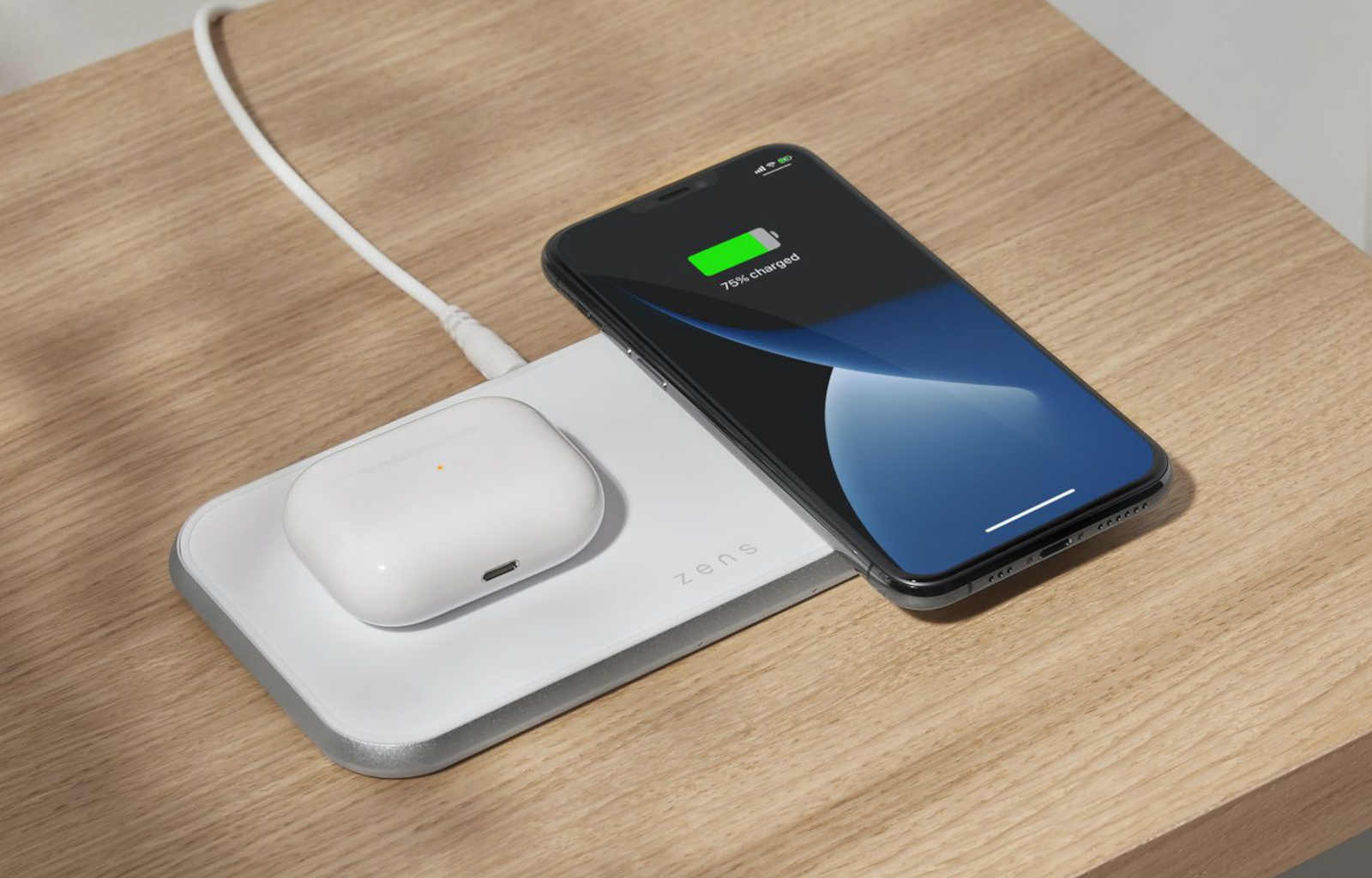 iPhone and Airpods charger on aluminium wireless charger